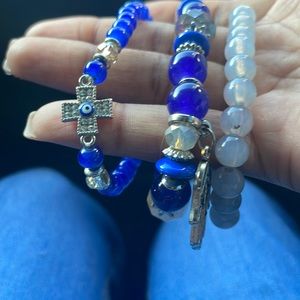 Three blue bracelets